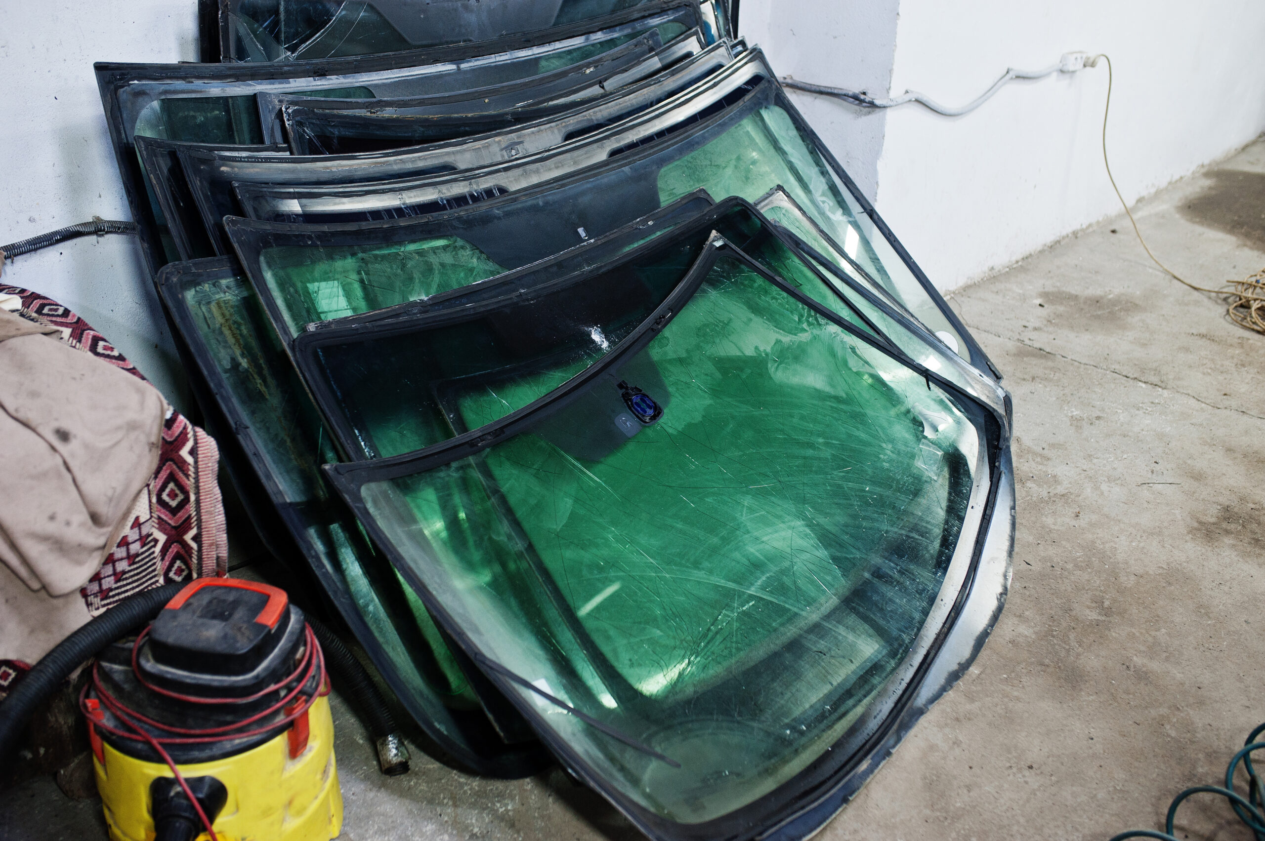 Broken car windshield, replacing windscreen of a car in auto ser